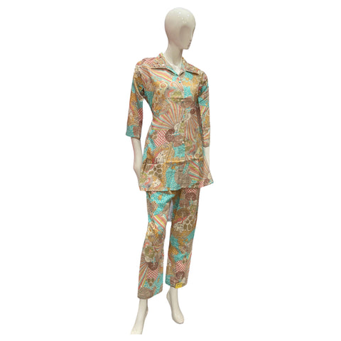 Women Abstract print 2 pc coord set with hand emroidery on the collar and front buttons.