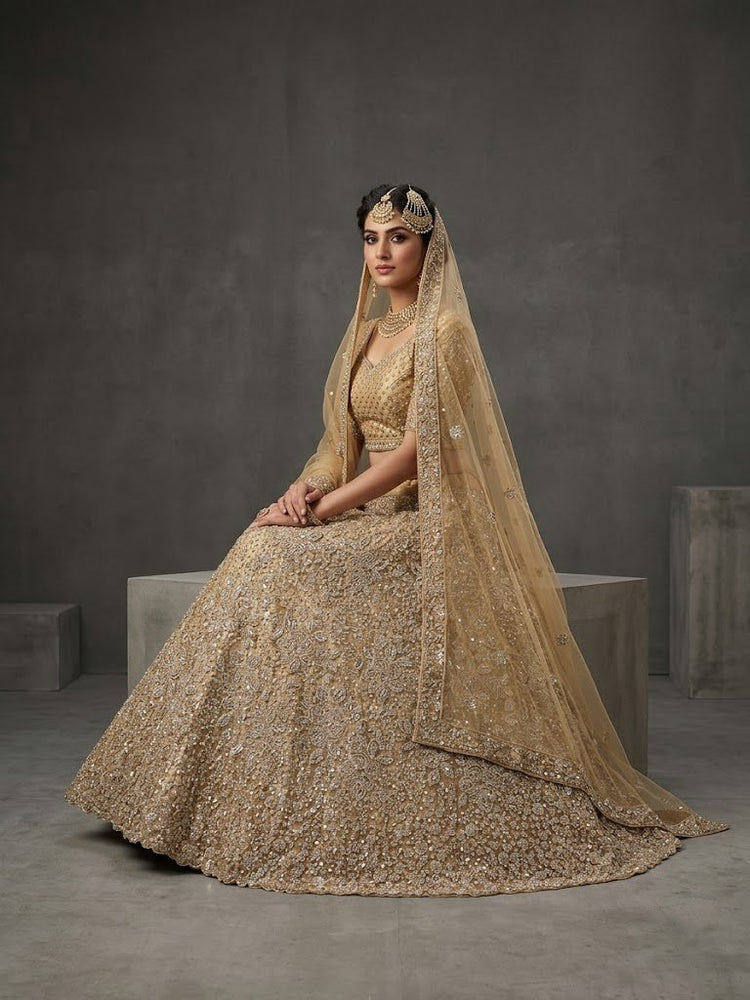 Gold lehanga with handwork 900915